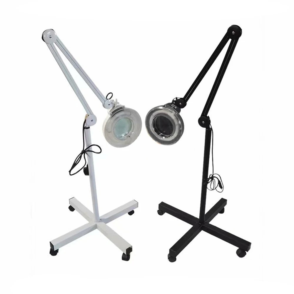 Two adjustable magnifying lamps on stands, one white and one black, on a white background.