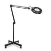 Magnifying glass on a stand with adjustable arm