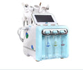 Skincare device with multiple bottles labeled A, B, and C on a white background