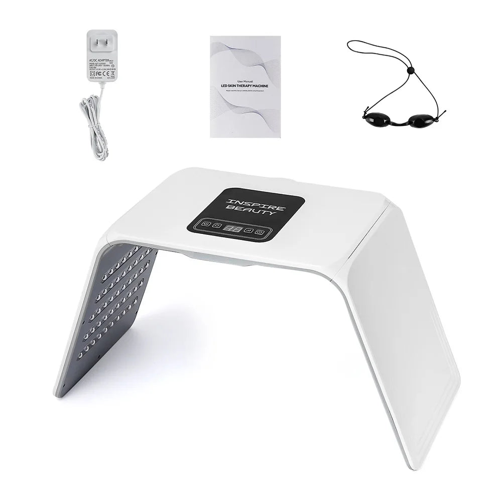 White LED beauty light with accessories on a white background