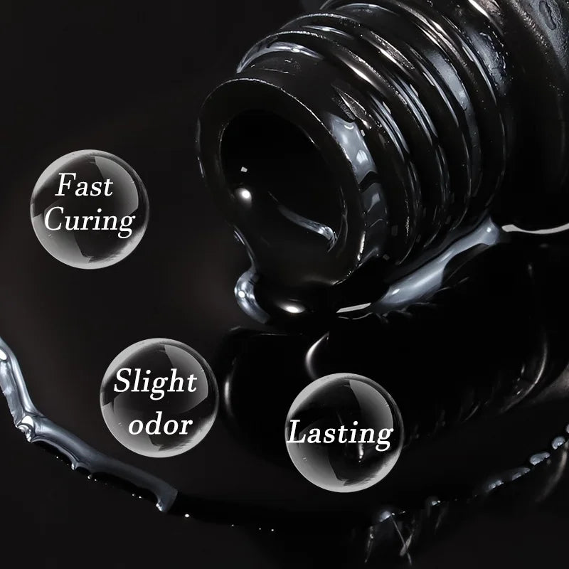 Close-up of a black nail polish bottle with text on a dark background