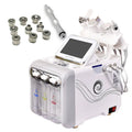 Beauty device with attachments on a white background