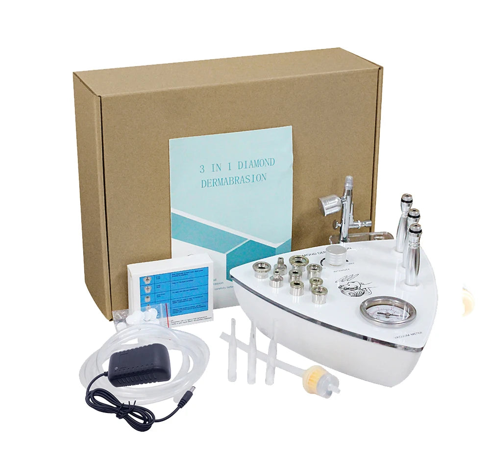 Diamond dermabrasion machine with accessories and packaging on a white background